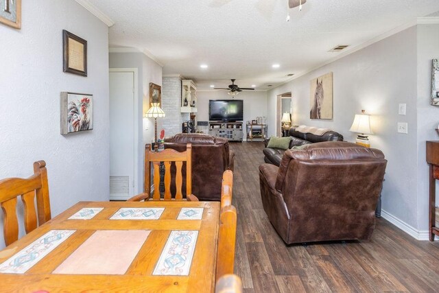9216 Fm 195, Paris, TX 75462 - dining room with a ceiling fan, dark wood finished floors, ornamental molding, recessed lighting, and baseboards