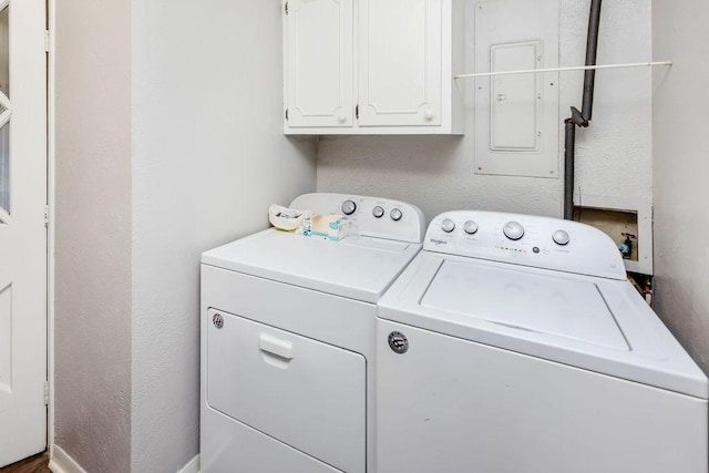 9216 Fm 195, Paris, TX 75462 - clothes washing area with cabinet space, washer and dryer, and electric panel