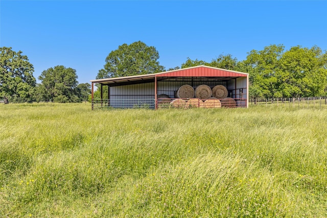 9216 Fm 195, Paris, TX 75462 - view of yard with a pole building, an outbuilding, and fence