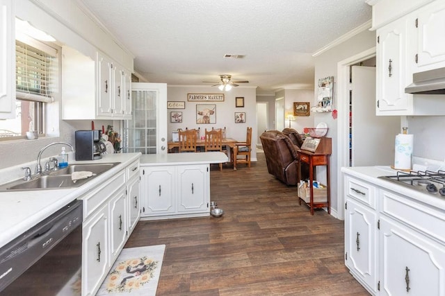 9216 Fm 195, Paris, TX 75462 - kitchen featuring a sink, dishwasher, a ceiling fan, a peninsula, and white cabinetry