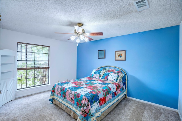 5808 Arbor Valley Dr, Arlington, TX 76016 - bedroom with carpet floors, a textured ceiling, a ceiling fan, and baseboards