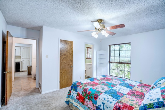 5808 Arbor Valley Dr, Arlington, TX 76016 - carpeted bedroom with ceiling fan and a textured ceiling