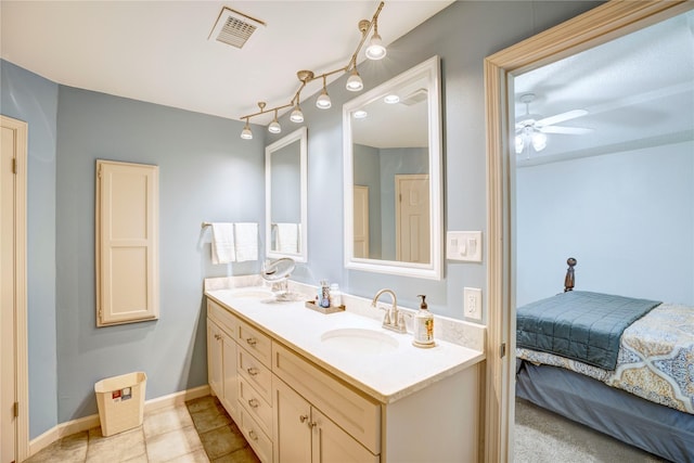5808 Arbor Valley Dr, Arlington, TX 76016 - ensuite bathroom with double vanity, a ceiling fan, baseboards, and tile patterned flooring