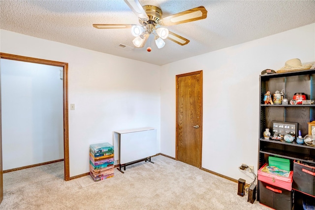 5808 Arbor Valley Dr, Arlington, TX 76016 - playroom with carpet flooring, a ceiling fan, a textured ceiling, and baseboards