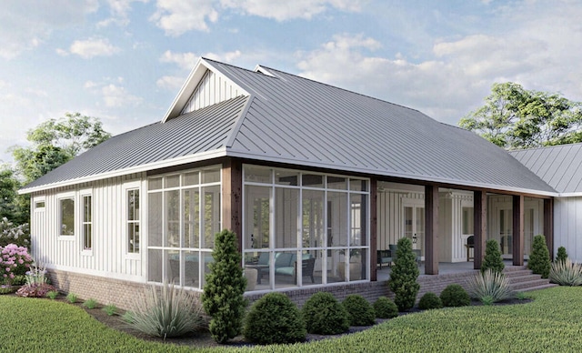 BedTBD Eagles Ridge Drive, Brock, TX 76087 - rear view of property with a sunroom, a standing seam roof, metal roof, brick siding, and a yard