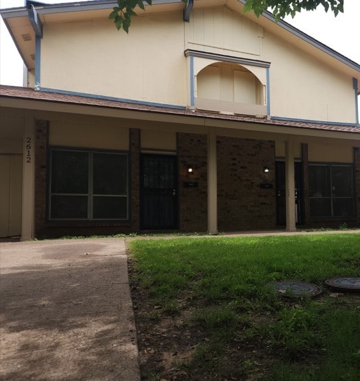 2614 Santa Barbara Dr, Grand Prairie, TX 75052 - view of front of house with stucco siding