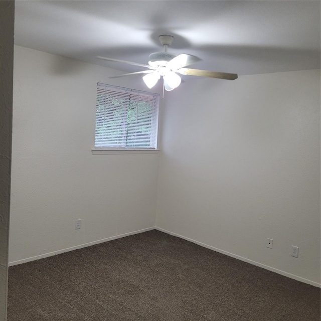 2614 Santa Barbara Dr, Grand Prairie, TX 75052 - unfurnished room with ceiling fan, dark carpet, and baseboards