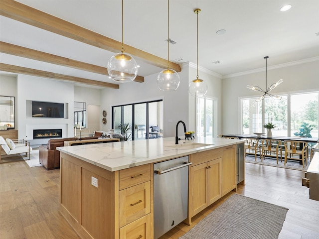 2015 Honey Ln, Celina, TX 75009 - kitchen with stainless steel dishwasher, a sink, healthy amount of natural light, light wood finished floors, and ornamental molding
