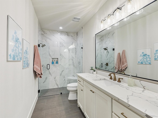2015 Honey Ln, Celina, TX 75009 - bathroom featuring a marble finish shower, toilet, vanity, and baseboards