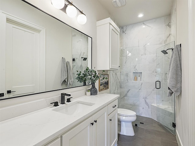 2015 Honey Ln, Celina, TX 75009 - full bath featuring a marble finish shower, vanity, toilet, and recessed lighting