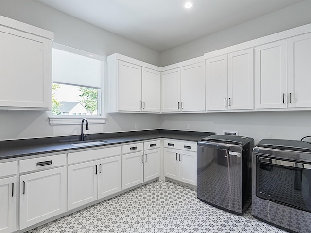 2015 Honey Ln, Celina, TX 75009 - clothes washing area featuring cabinet space, light flooring, washer and clothes dryer, and recessed lighting