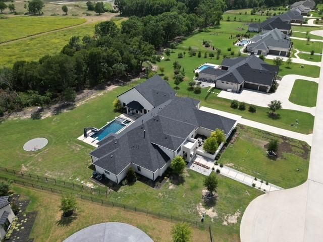 2015 Honey Ln, Celina, TX 75009 - drone / aerial view of a pool