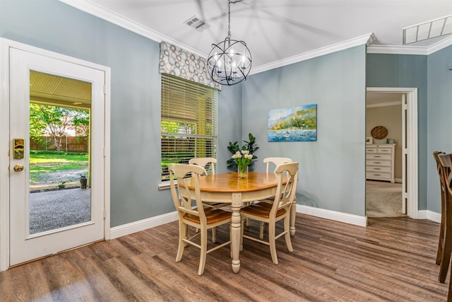 4 Raintree Ct, Mansfield, TX 76063 - dining room featuring crown molding, a chandelier, wood finished floors, and plenty of natural light