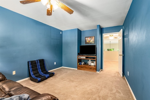 4 Raintree Ct, Mansfield, TX 76063 - living area featuring a ceiling fan, carpet floors, and baseboards