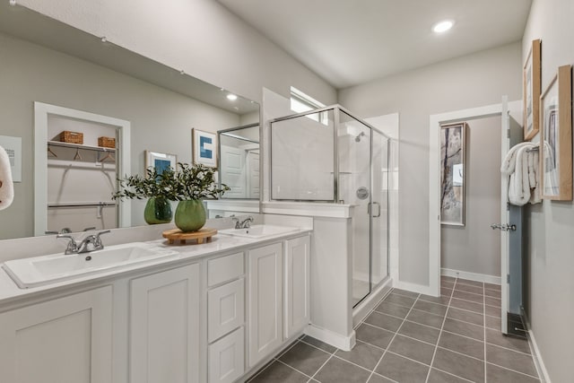 10645 Nokose St, Fort Worth, TX 76179 - full bathroom featuring a stall shower, tile patterned flooring, double vanity, a walk in closet, and recessed lighting