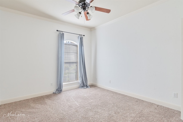 unfurnished room with light carpet, ceiling fan, ornamental molding, and baseboards