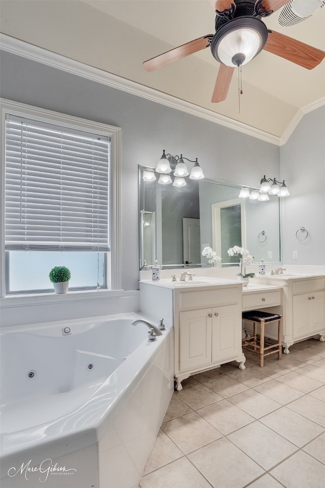 bathroom with crown molding, tile patterned flooring, a tub with jets, vanity, and ceiling fan