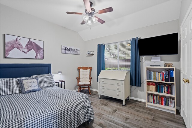 1701 Travis Ct, Allen, TX 75002 - bedroom with lofted ceiling, wood finished floors, baseboards, and ceiling fan