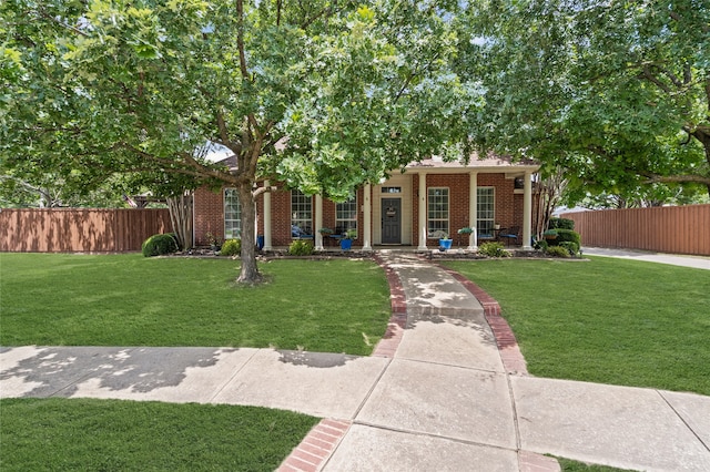 1701 Travis Ct, Allen, TX 75002 - view of front facade featuring brick siding and a porch