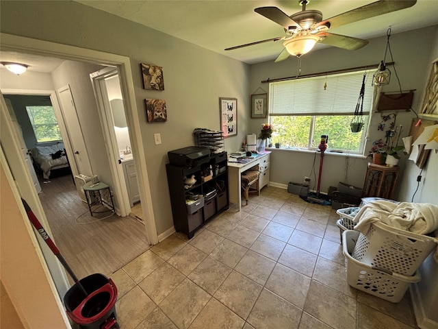 4233 Ridgecrest Cir, Lake Worth, TX 76135 - home office with plenty of natural light, ceiling fan, baseboards, and light tile patterned floors