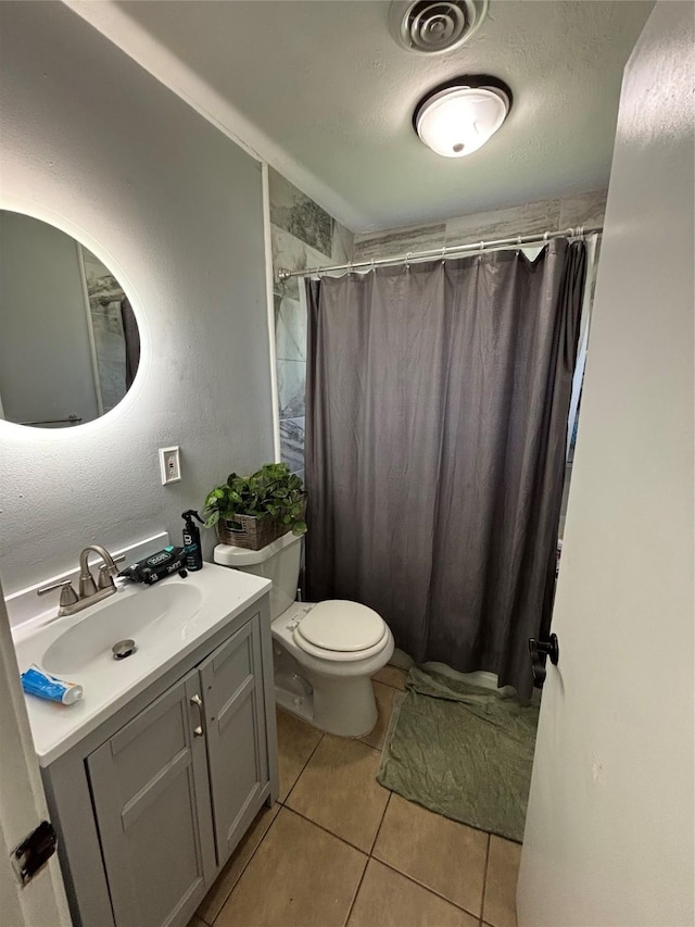 4233 Ridgecrest Cir, Lake Worth, TX 76135 - bathroom with tile patterned flooring, a shower with shower curtain, vanity, and toilet
