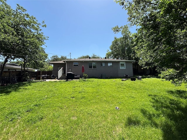 4233 Ridgecrest Cir, Lake Worth, TX 76135 - rear view of house featuring entry steps