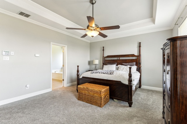 bedroom with ornamental molding, light carpet, a raised ceiling, baseboards, and ceiling fan