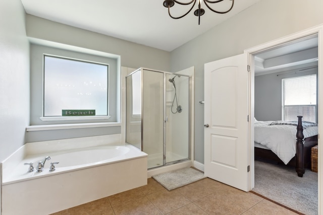 full bath with a stall shower, tile patterned flooring, a garden tub, and ensuite bathroom