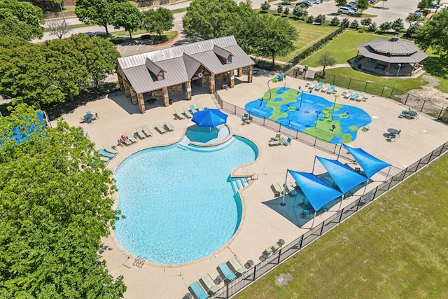 community pool featuring a gazebo and a patio