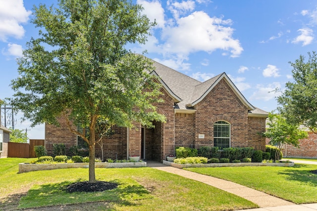 1250 Amistad Dr, Prosper, TX 75078 - traditional home with brick siding and a shingled roof