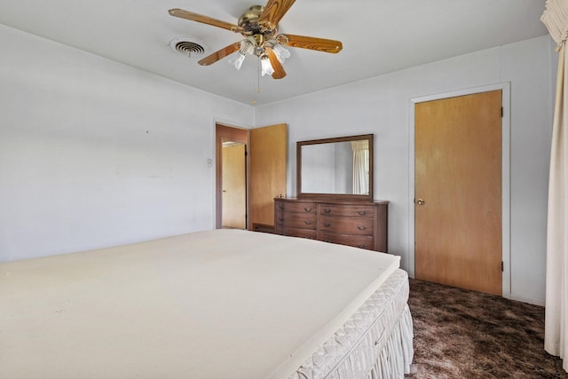 531 Eisenhower Rd, Denison, TX 75020 - bedroom with dark colored carpet and ceiling fan