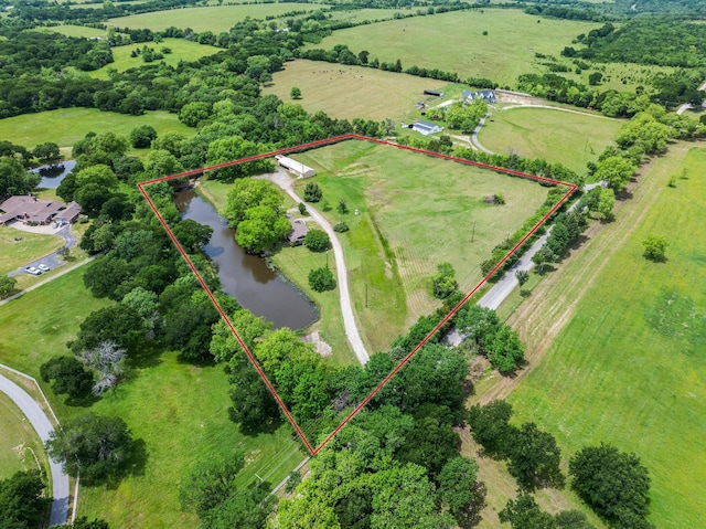 531 Eisenhower Rd, Denison, TX 75020 - aerial view of sparsely populated area with a nearby body of water and property boundaries highlighted