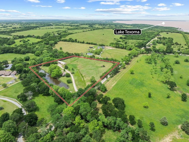 531 Eisenhower Rd, Denison, TX 75020 - aerial view of sparsely populated area featuring property parcel outlined and a nearby body of water