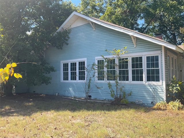 118 S 31st St, Corsicana, TX 75110 - view of property exterior featuring a lawn