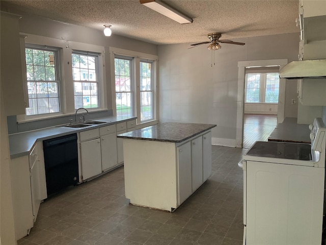 118 S 31st St, Corsicana, TX 75110 - kitchen featuring black dishwasher, white electric range, a sink, under cabinet range hood, and a textured ceiling