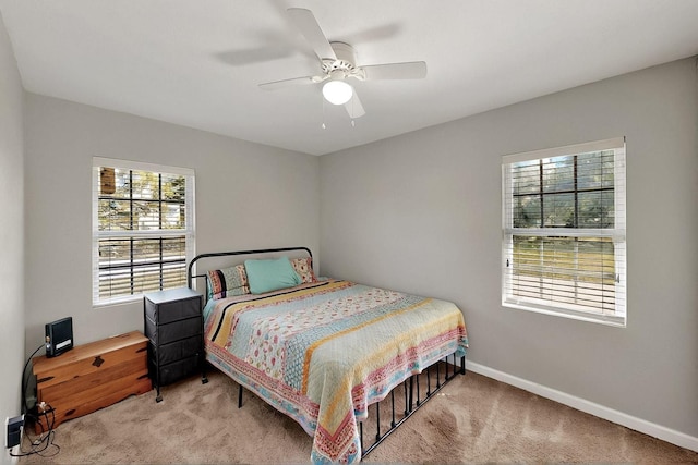 1508 E Dellis St, Kaufman, TX 75142 - bedroom with carpet floors, baseboards, and a ceiling fan