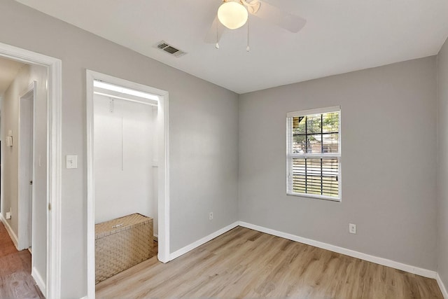 1508 E Dellis St, Kaufman, TX 75142 - unfurnished bedroom featuring wood finished floors, baseboards, and a closet