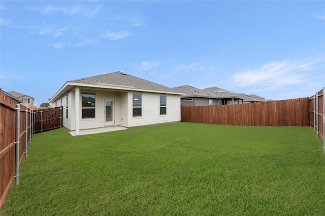 1705 Teton Riv, Blue Ridge, TX 75424 - back of house featuring a shingled roof and a patio