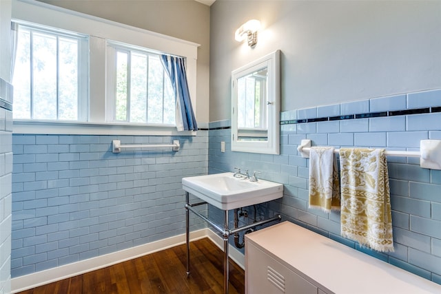 5020 Junius St, Dallas, TX 75214 - bathroom featuring plenty of natural light, wood finished floors, tile walls, and wainscoting