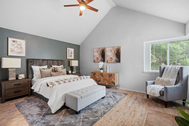 1115 Cherrytree Dr, Arlington, TX 76001 - bedroom featuring wood finished floors, high vaulted ceiling, and a ceiling fan