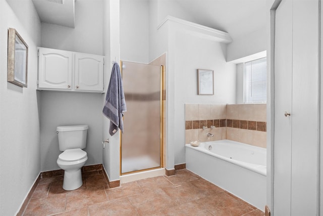 1115 Cherrytree Dr, Arlington, TX 76001 - full bathroom with a shower stall, toilet, baseboards, and a garden tub