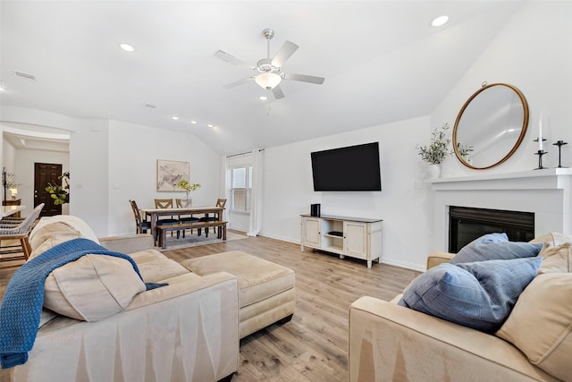 2434 Solomons Pl, Wylie, TX 75098 - living area featuring vaulted ceiling, ceiling fan, light wood-type flooring, baseboards, and recessed lighting