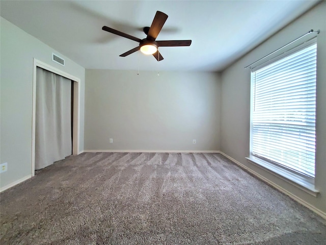 912 Chadwick Dr, Richardson, TX 75080 - unfurnished room with ceiling fan, carpet floors, and baseboards
