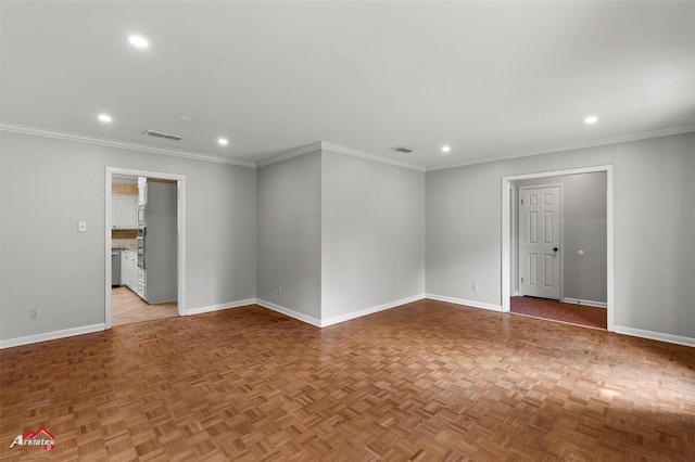 unfurnished room with baseboards, recessed lighting, and crown molding