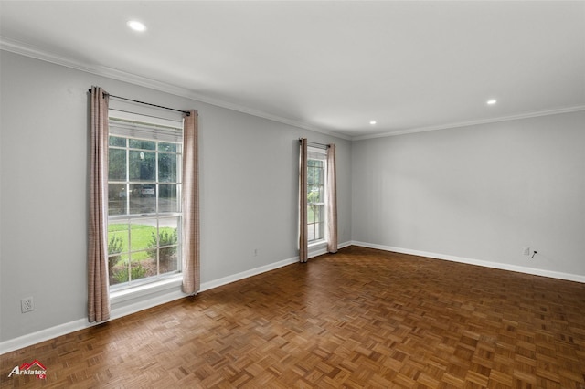 empty room featuring plenty of natural light, baseboards, recessed lighting, and ornamental molding