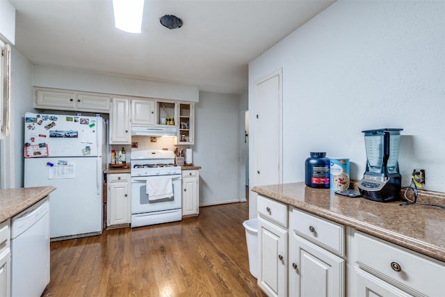 2902 Hillglenn Rd, Dallas, TX 75228 - kitchen featuring white appliances, under cabinet range hood, and white cabinets