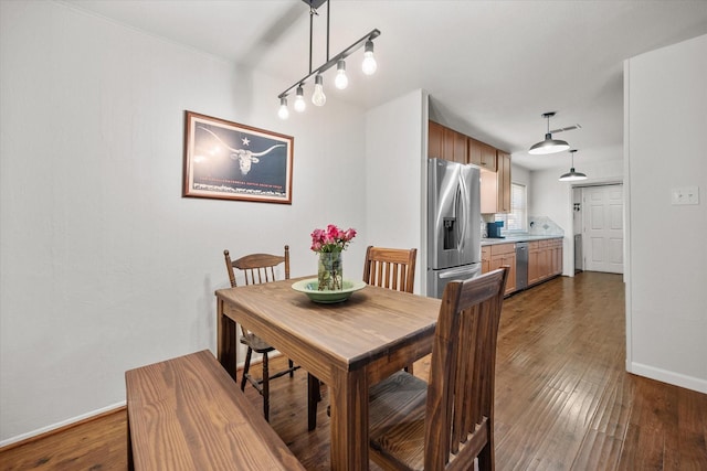 332 Thompson Dr, Saginaw, TX 76179 - dining room featuring baseboards and dark wood-style floors