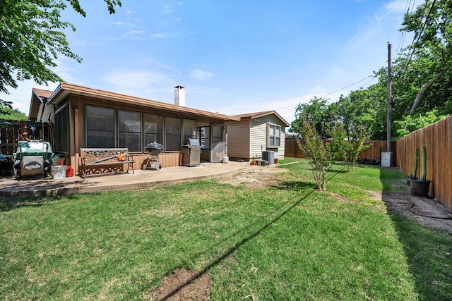 332 Thompson Dr, Saginaw, TX 76179 - rear view of property featuring a patio, central air condition unit, and a chimney
