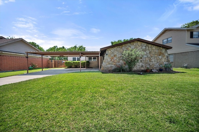 332 Thompson Dr, Saginaw, TX 76179 - view of front of property with driveway, stone siding, and an attached carport
