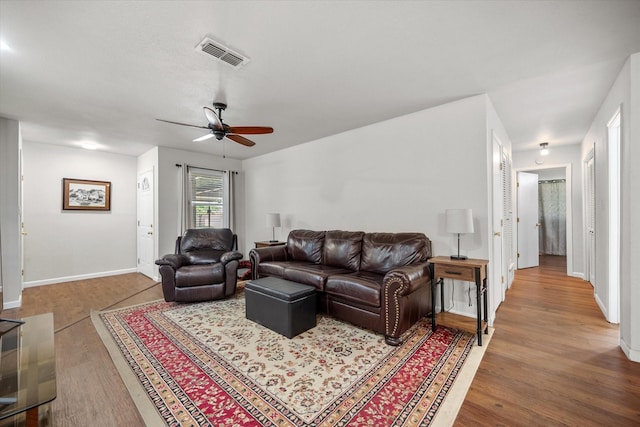 332 Thompson Dr, Saginaw, TX 76179 - living room featuring ceiling fan, wood finished floors, and baseboards